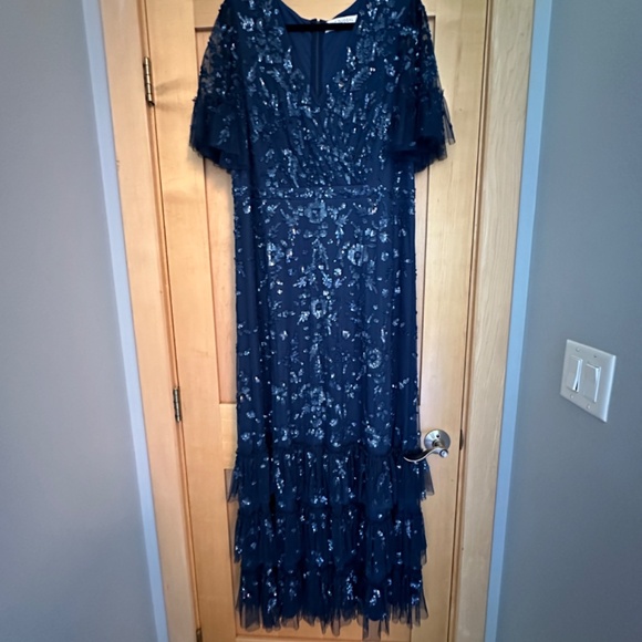 MAC DUGGAL PLUS SIZE NAVY SEQUINED FLUTTER SLEEVE FAUX WRAP V-NECK TIERED GOWN - Picture 6 of 10